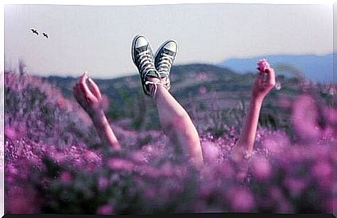 Woman lying in the flowers