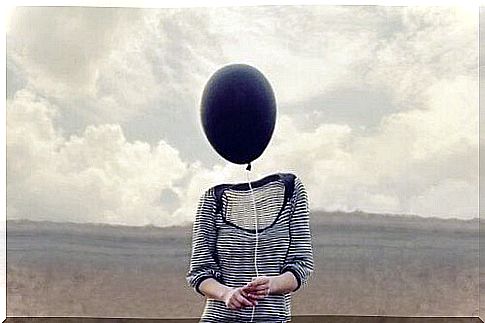 Woman with balloon for head