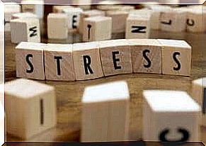 The word stress spelled out on wooden blocks