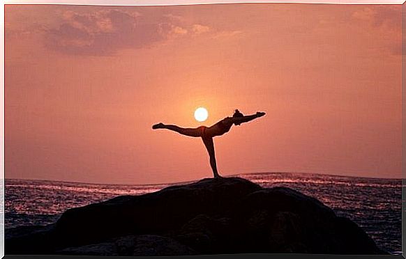 Woman doing yoga for her mental state