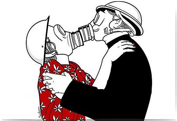 Couple trying to kiss with gas masks on