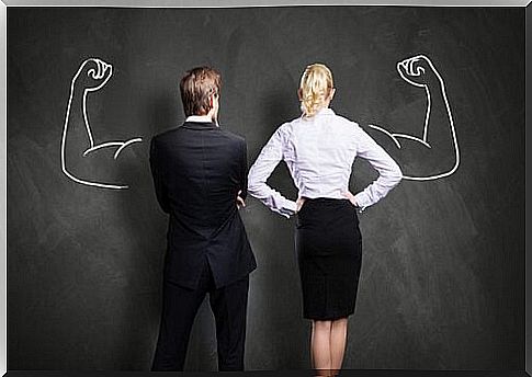 Businessman and businesswoman with their backs to the camera